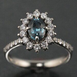 Montana Blue Sapphire and Diamond Ring 14 KT White Gold